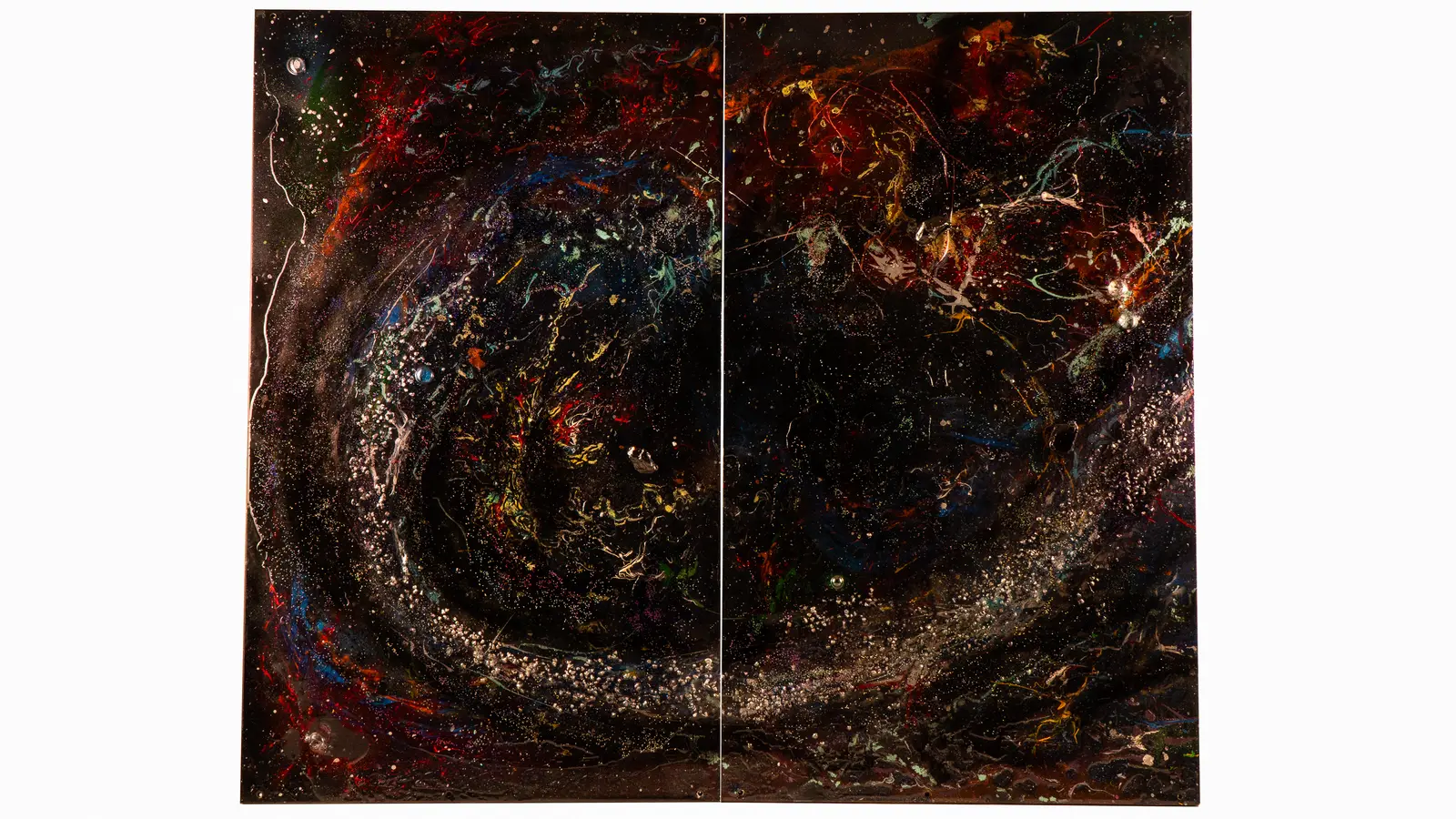 Le diptyque cosmique sous un autre éclairage, reflets sur la surface brillante des deux panneaux