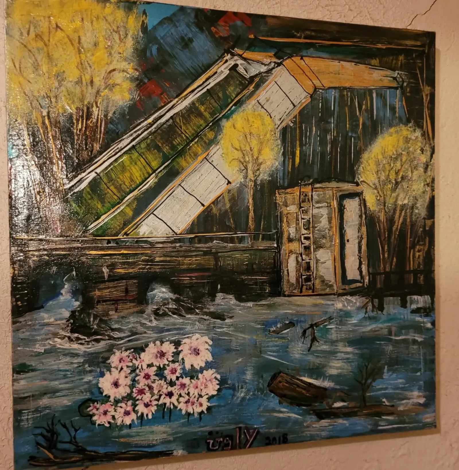 The painting photographed at an angle from the left, hung on a rough beige stucco wall, its glossy surface catching the light and its edge visible along the left side
